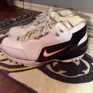 Nike White and Black High-Top Sneakers with Red Accents